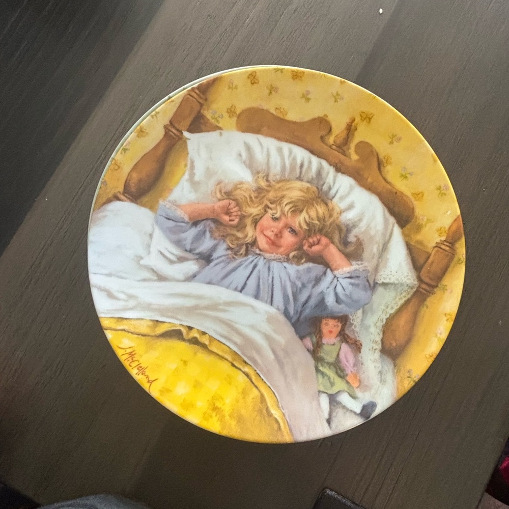 Decorative Plate with Sleeping Child Design